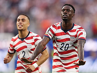 Folarin Balogun #20 of the United States celebrates scoring his team's third goal during the FIFA World Cup 2026 Group D match against Paraguay at Los Angeles Stadium on June 12, 2026 in Los Angeles, California.   
