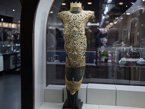 The dress, showcased by Al Romaizan Gold & Jewellery, is being displayed publicly for the first time during the exhibition at Expo Centre Sharjah.