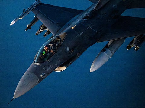 A US Air Force F-16 fighter jet patrols the skies above the Middle East as American forces maintain regional presence and vigilance.