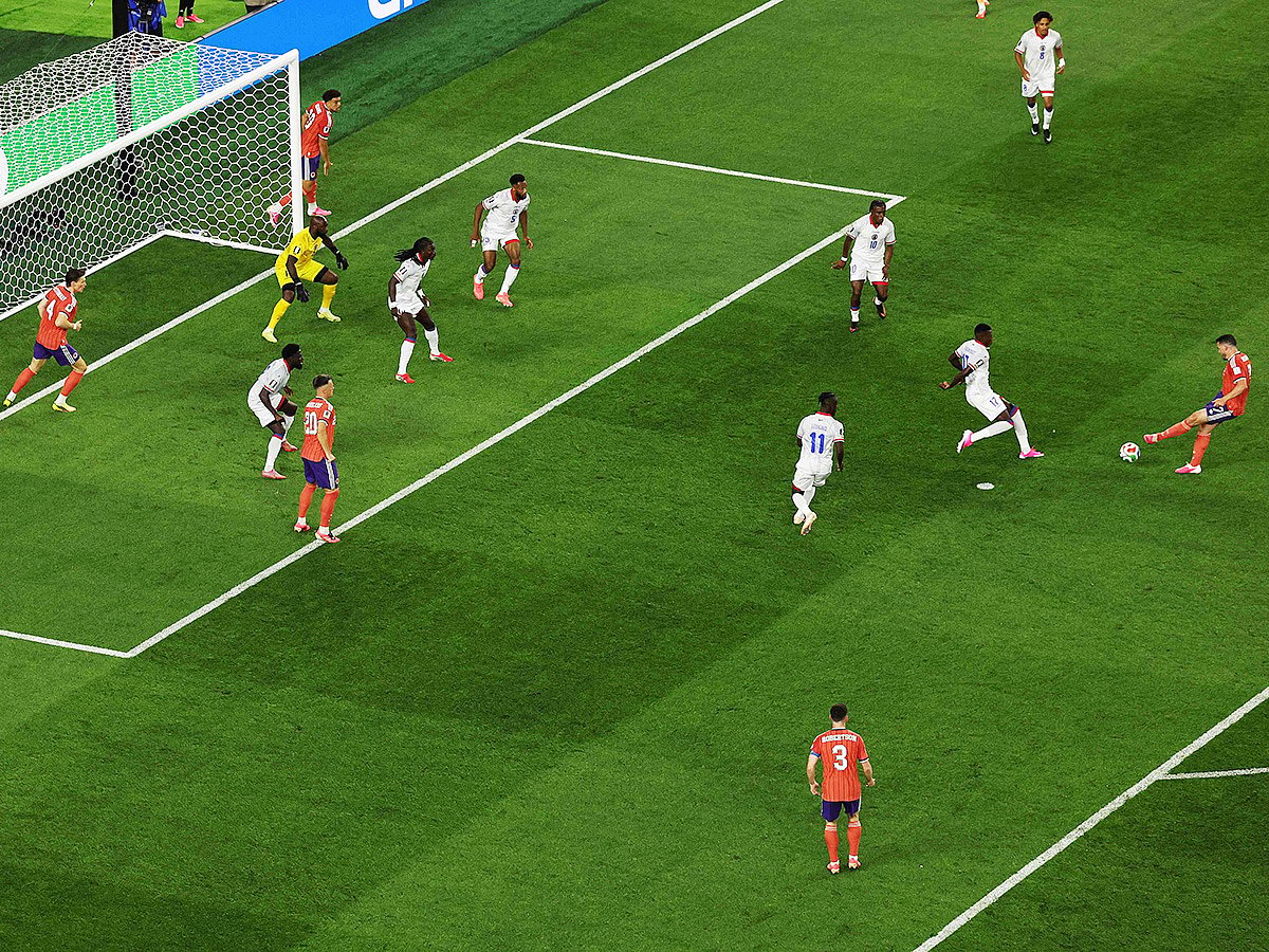John McGinn of Scotland scores his team's first goal past Johny Placide of Haiti during the FIFA World Cup 2026 Group C match at Boston Stadium on June 13, 2026 in Foxborough, Massachusetts.
