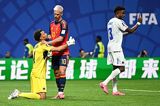 Cape Verde's goalkeeper #01 Vozinha (L) and Spain's forward #10 Dani Olmo (C) apologize after a contact during the 2026 World Cup Group H football match between Spain and Cape Verde at the Atlanta Stadium in Atlanta on June 15, 2026.