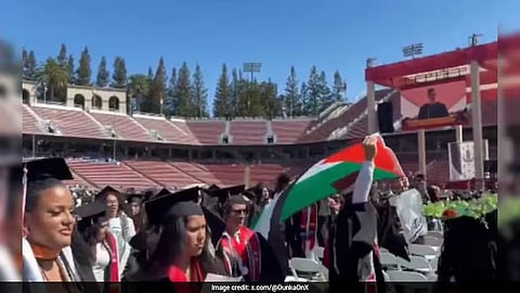 As Pichai was introduced at the Californian university, students stood up from their seats, waved Palestinian flags, blew whistles and chanted slogans.