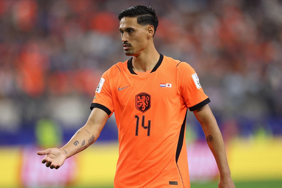 Tijjani Reijnders #14 of Netherlands during the FIFA World Cup 2026 Group F match between Netherlands and Japan at Dallas Stadium on June 14, 2026 in Dallas, Texas.
