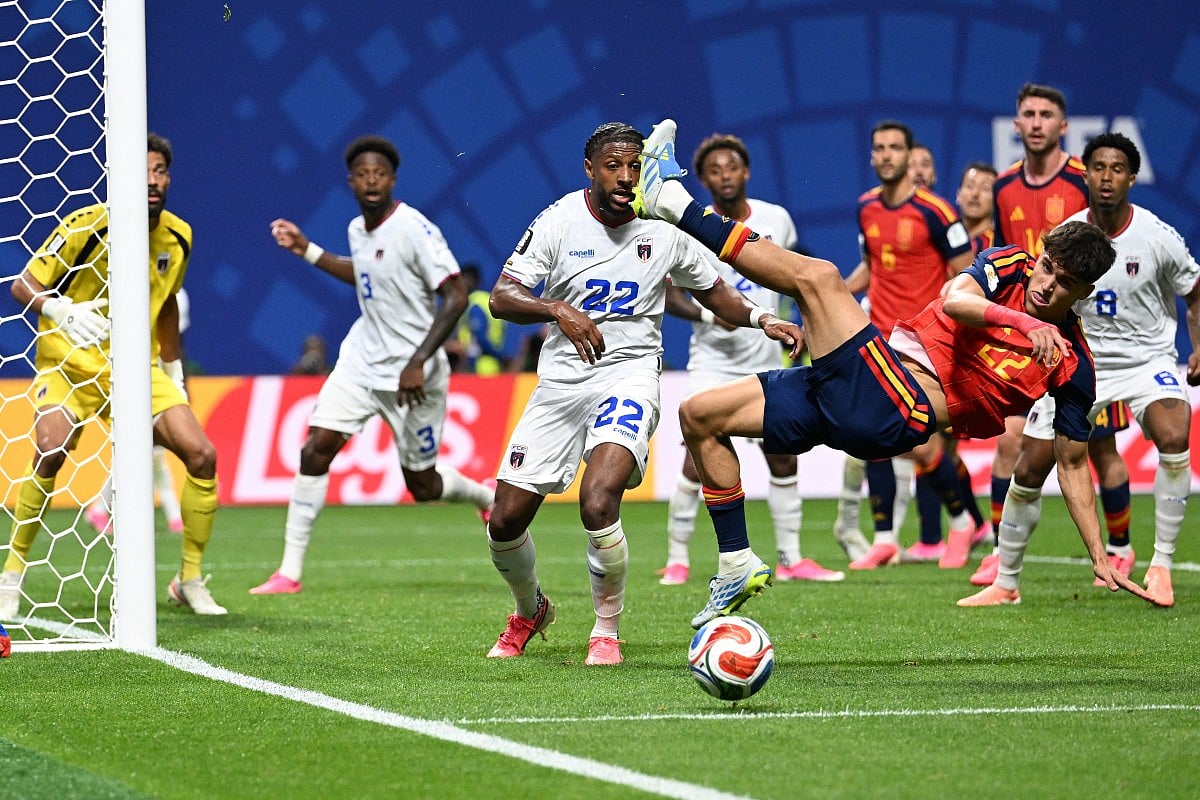 Spain's defender #22 Pau Cubarsi (R) misses the ball during the 2026 World Cup Group H football match between Spain and Cape Verde at the Atlanta Stadium in Atlanta on June 15, 2026.