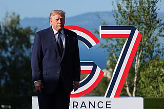 US President Donald Trump arrives for the official greeting during the G7 summit, in Evian, eastern France, on June 15, 2026.