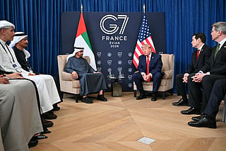 US President Donald Trump attends a bilateral meeting with UAE's President Sheikh Mohamed bin Zayed al-Nahyan, as US Secretary of State Marco Rubio and US Secretary of Treasury Scott Bessent (R) look on during the G7 summit, in Evian, eastern France, on June 16, 2026.