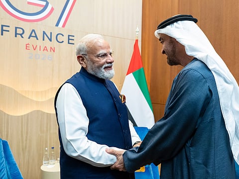 Sheikh Mohamed bin Zayed Al Nahyan (R) greets Narendra Modi (L).