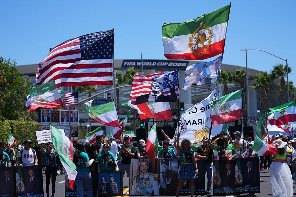 People protest outside Los Angeles Stadium before the World Cup Group G soccer match between Iran and New Zealand in Inglewood, Calif., near Los Angeles, Monday, June 15, 2026. (AP Photo/Jae C. Hong)