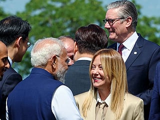 Prime Minister Narendra Modi interacts with Italy's Prime Minister Giorgia Meloni at the G7 Summit, in Evian on Tuesday, jUNE 16, 2026. 