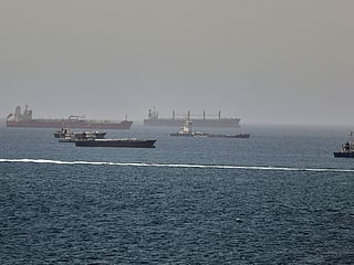 Tankers and cargo vessels are seen in the Gulf of Oman, along shipping routes linking the Strait of Hormuz and the Arabian Sea.
