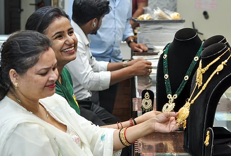 Gold, silver trade lower as traders await Fed decision later this week