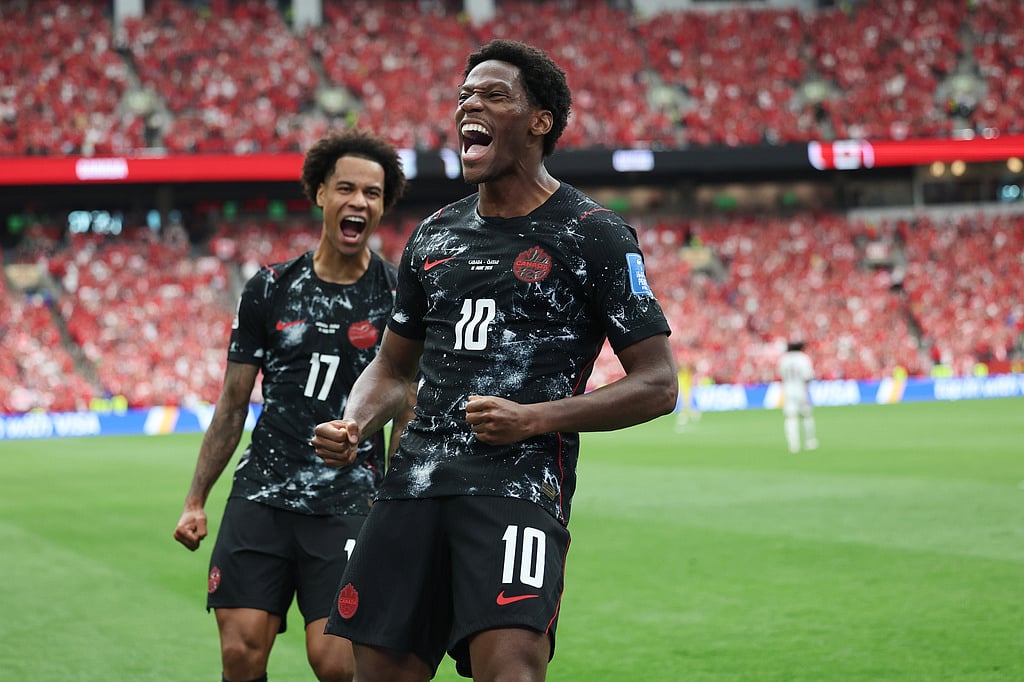 Canada's Jonathan David (10) celebrates after scoring their second goal during the World Cup Group B soccer match between Canada and Qatar in Vancouver, British Columbia, Thursday, June 18, 2026. (AP Photo/Emma Peterson)