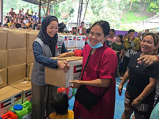 UAE team members distribute relief aid to vulnerable communities after earthquake damage.