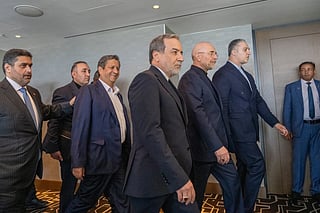 Iran's delegation including Minister of Foreign Affairs of Iran Abbas Araghchi (C) and Speaker of the Islamic Parliament of Iran, Mohammed Bagher Ghalibaf (3rdR) arrive for a quadrilateral meeting between the United States, Iran, Pakistan and Qatar at the Burgenstock luxury hotel complex near Lake Lucerne, Switzerland, on June 21, 2026, as part of talks aimed at advancing a deal to end the Middle East conflict.