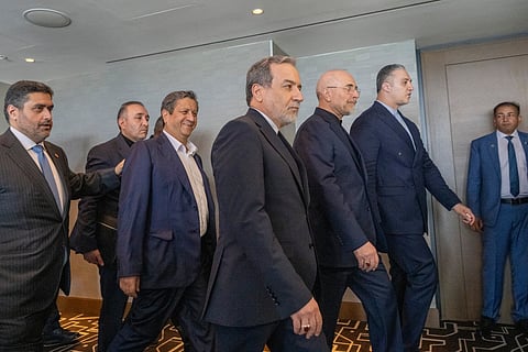 Iran's delegation including Minister of Foreign Affairs of Iran Abbas Araghchi (C) and Speaker of the Islamic Parliament of Iran, Mohammed Bagher Ghalibaf (3rdR) arrive for a quadrilateral meeting between the United States, Iran, Pakistan and Qatar at the Burgenstock luxury hotel complex near Lake Lucerne, Switzerland, on June 21, 2026, as part of talks aimed at advancing a deal to end the Middle East conflict.