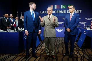 Pakistan's Prime Minister Shehbaz Sharif (C) speaks next to US Vice President JD Vance (L) and Qatar's Prime Minister and Minister for Foreign Affairs Sheikh Mohammed bin Abdulrahman bin Jassim Al-Thani during a quadrilateral meeting between the United States, Iran, Pakistan and Qatar at the Burgenstock luxury hotel complex overlooking Lake Lucerne, Switzerland, on June 21, 2026, as part of high-level talks aimed at advancing a deal to end the Middle East conflict.