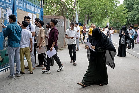 Medical students arrive to appear for the NEET-UG re-examination in New Delhi on June 21, 2026.