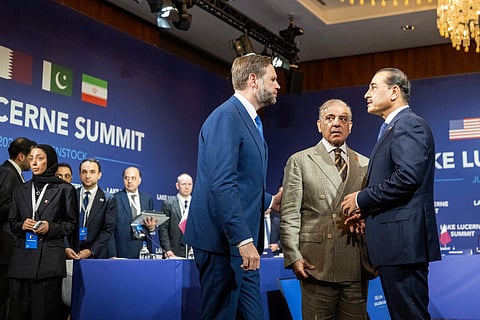 US Vice President JD Vance (L) speaks next to Pakistan's Prime Minister Shehbaz Sharif (C) and Qatar's Prime Minister Sheikh Mohammed bin Abdulrahman bin Jassim Al Thani prior to a quadrilateral meeting between the United States, Iran, Pakistan and Qatar at the Burgenstock luxury hotel complex overlooking Lake Lucerne, Switzerland, on June 21, 2026.