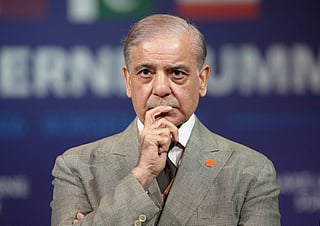 Pakistan's Prime Minister Shehbaz Sharif reacts prior to a quadrilateral meeting between the United States, Iran, Pakistan and Qatar at the Burgenstock luxury hotel complex overlooking Lake Lucerne, Switzerland, on June 21, 2026, as part of high-level talks aimed at advancing a deal to end the Middle East conflict.