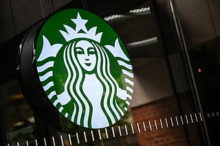 The logo of Starbucks coffee company is seen on a shop's window in Seoul on June 22, 2026.