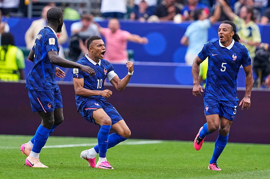 France's Kylian Mbappe (10) celebrates after scoring his team's first goal during the World Cup Group I soccer match between France and Iraq in Philadelphia, Monday, June 22, 2026. (AP Photo/Petr David Josek)