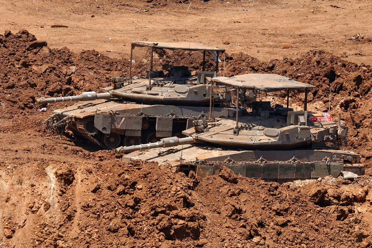 Israeli tanks positioned along the border with southern Lebanon.