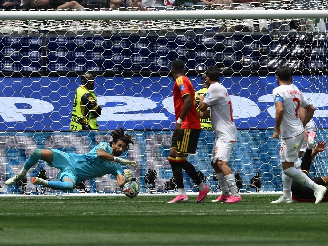 Iran's goalkeeper Alireza Beiranvand makes a save during the 2026 World Cup Group G football match against Belgium at the Los Angeles Stadium in Inglewood on June 21, 2026.