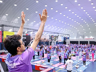 Anis Sajan leads Yoga Day event for over 500 residents