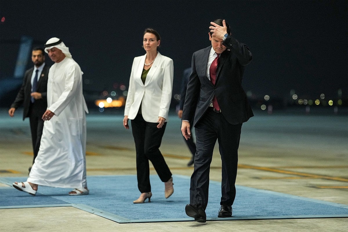 US Secretary of State Marco Rubio adjusts his hair following his arrival at al-Bateen Executive Airport in Abu Dhabi on June 23, 2026, on the first stop of a tour of Gulf states aimed at showing solidarity with key allies hit hard by the Middle East war.