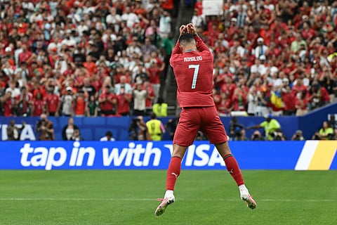 Portugal's forward #07 Cristiano Ronaldo celebrates after scoring the opening goal during the 2026 World Cup Group K football match between Portugal and Uzbekistan at the Houston Stadium in Houston on June 23, 2026.