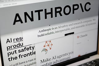 FILE - Pages from the Anthropic website and the company's logo are displayed on a computer screen in New York, Feb. 26, 2026.