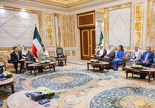 This hand out photo provided by the Kuwait's news agency KUNA on June 24, 2026 shows the Amir of Kuwait Sheikh Meshal al-Ahmad al-Jaber al-Sabah (Top 3rd-L) receiving the US Secretary of State Marco Rubio (Top L) at the Bayan Palace in Kuwait City.