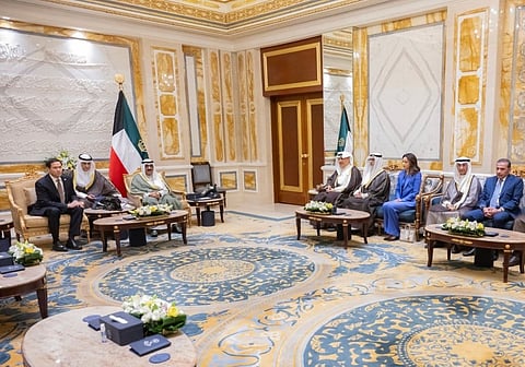 This hand out photo provided by the Kuwait's news agency KUNA on June 24, 2026 shows the Amir of Kuwait Sheikh Meshal al-Ahmad al-Jaber al-Sabah (Top 3rd-L) receiving the US Secretary of State Marco Rubio (Top L) at the Bayan Palace in Kuwait City.