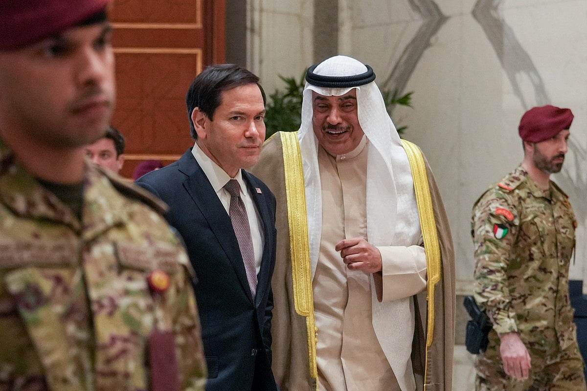 US Secretary of State Marco Rubio walks with Kuwait's Crown Prince Sheikh Sabah Khaled al-Hamad al-Sabah after their meeting at Bayan Palace during Rubio's visit to the Middle East to discuss the interim deal between the US and Iran with Arab Gulf allies, in Kuwait City on June 24, 2026.