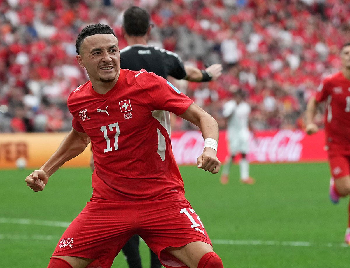 Switzerland's Ruben Vargas (17) celebrates after scoring during the World Cup Group B soccer match between Switzerland and Canada in Vancouver, British Columbia.
