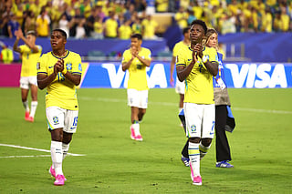 Endrick #19 and Vinicius Junior #7 of Brazil applaud fans after the 3-0 win during the FIFA World Cup 2026 Group C match between Scotland and Brazil at Miami Stadium on June 24, 2026 in Miami Gardens, Florida.