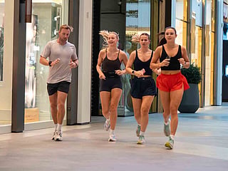 Early risers walk and jog inside Dubai's malls as the Dubai Mallathon transforms shopping destinations into vibrant fitness hubs throughout the summer season.
