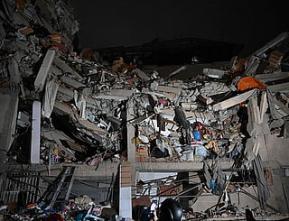 View of a collapsed building following an earthquake in Caracas.