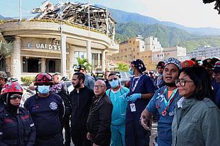 Handout picture released by the Venezuelan presidency press office showing Venezuela's interim President Delcy Rodriguez visiting the area strongly affected by the earthquake in La Guaira, on June 25, 2026.