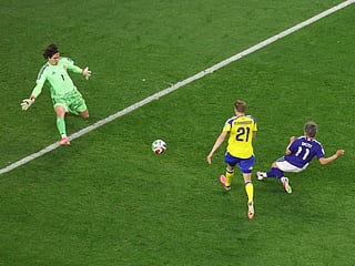 Daizen Maeda #11 of Japan scores his team's first goal during the FIFA World Cup 2026 Group F match against Sweden at Dallas Stadium on June 25, 2026 in Arlington, Texas.