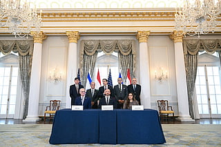 US Secretary of State Marco Rubio (C, back) speaks as he hosts a signing ceremony with Israeli Ambassador to the US Yechiel Leiter (L, front row), State Department Chief of Staff Daniel Holler (C, front row), and Lebanese Ambassador to the US Nada Hamadeh (R, front row) at the US Department of State in Washington, DC, on June 26, 2026.
