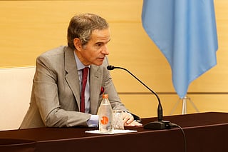 Rafael Mariano Grossi, Director General of the International Atomic Energy Agency (IAEA), speaks with Japanese Prime Minister Sanae Takaichi (not pictured) during a courtesy visit to Takaichi at the prime minister's office in Tokyo on June 26, 2026.