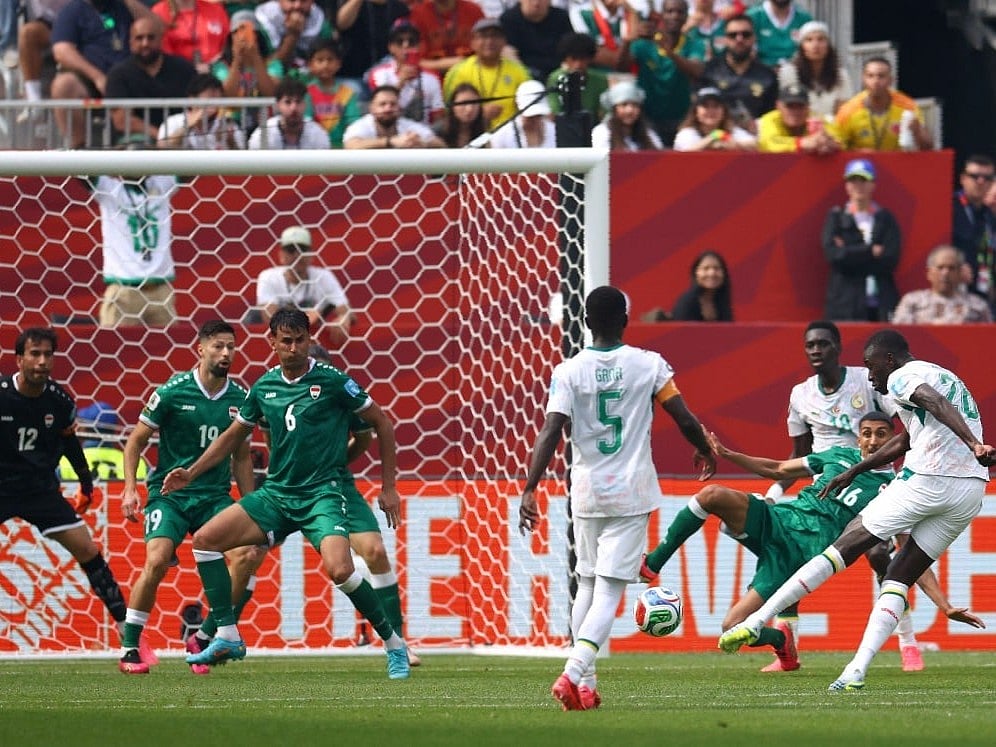 Senegal's midfielder #26 Pape Gueye scores his team's fouth goal during the 2026 World Cup Group I football match against Iraq at the Toronto Stadium in Toronto on June 26, 2026.