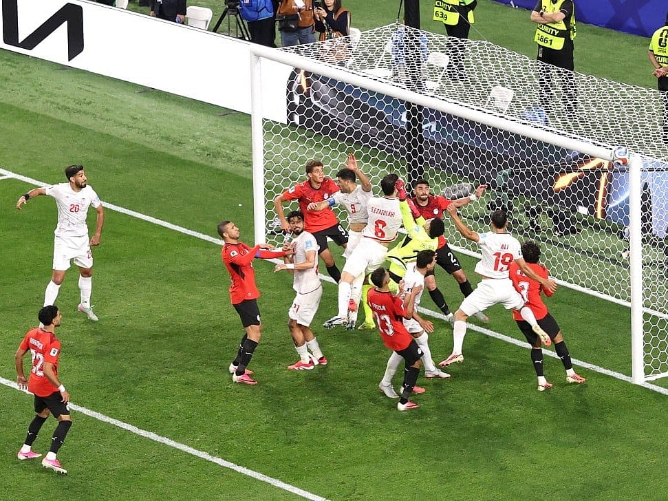 Mehdi Taremi #9 and Saeid Ezatolahi #6 of Iran look on as a header hits the crossbar during the FIFA World Cup 2026 Group G match against Egypt  at Seattle Stadium on June 26, 2026 in Seattle, Washington.
