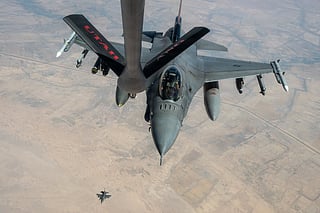 F-16 fighter jets fly over the Middle East during a patrol. US forces remain present and vigilant throughout the region.