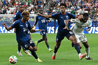 Cape Verde's defender #24 Wagner Pina (L) takes the ball as defender #08 Joao Paulo is challenged by Saudi Arabia's midfielder #23 Mohamed Kanno during the 2026 World Cup Group H football match at the Houston Stadium in Houston on June 26, 2026.