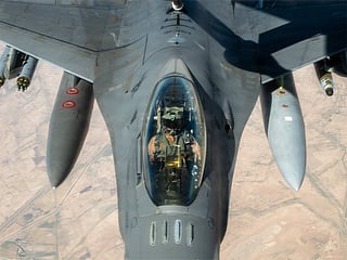 An F-16 US fighter jet fly over the Middle East during a patrol. 