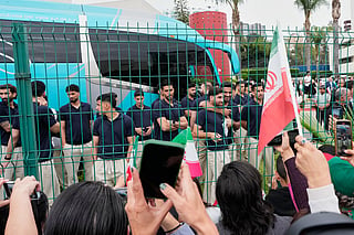 Fans greet members of the Iran World Cup soccer team as they leave their hotel for the airport Tuesday, June 30, 2026, in Tijuana, Mexico. 