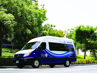 The service, launched in June 2025, allows passengers to book shared bus trips through a mobile application.