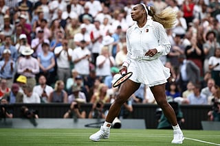 US player Serena Williams warms up prior to playing Australia's Maya Joint during their women's singles first round tennis match on the second day of the 2026 Wimbledon Championships at The All England Lawn Tennis and Croquet Club in Wimbledon, southwest London, on June 30, 2026.